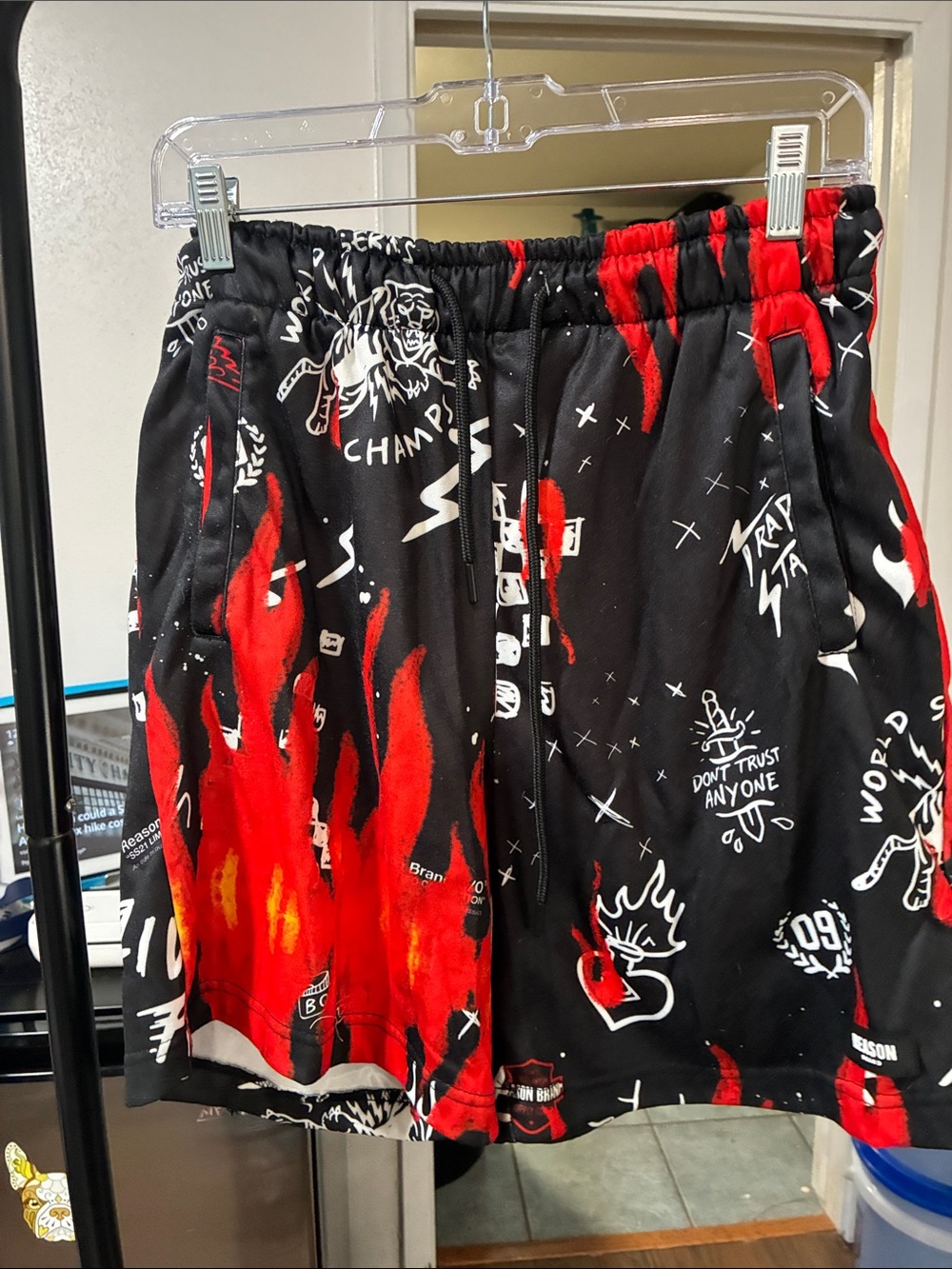 Reason Black Athletic Shorts with Red Flame Graphic
